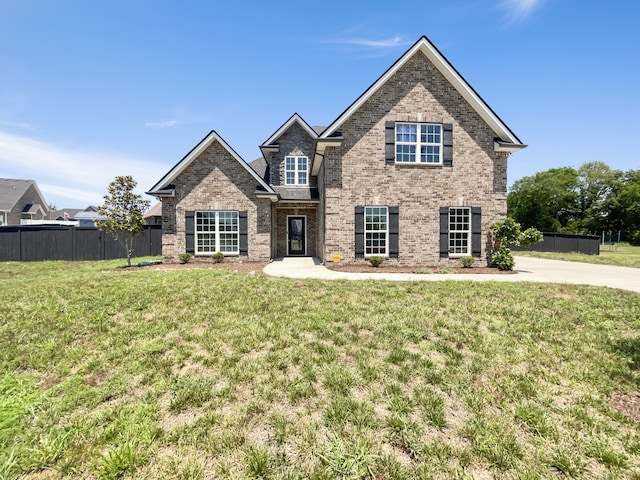 view of front of home with a front lawn