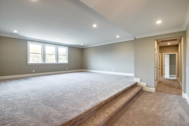 carpeted empty room with crown molding