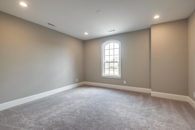 view of carpeted spare room