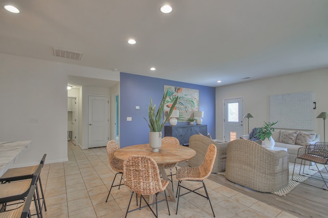 dining area with light tile floors