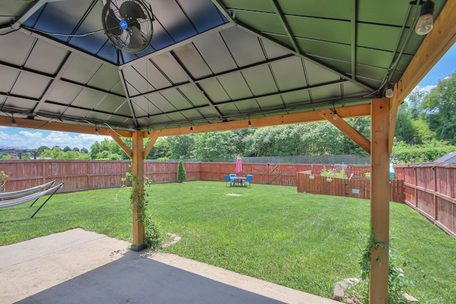 view of yard featuring a patio area and a gazebo