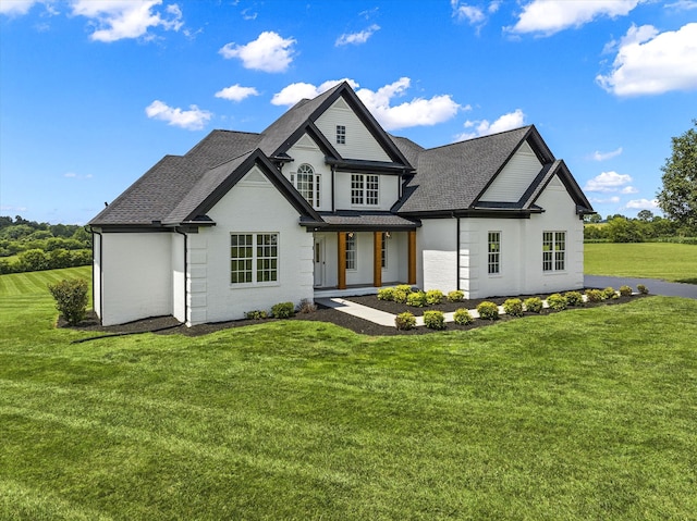 view of front of home with a front lawn