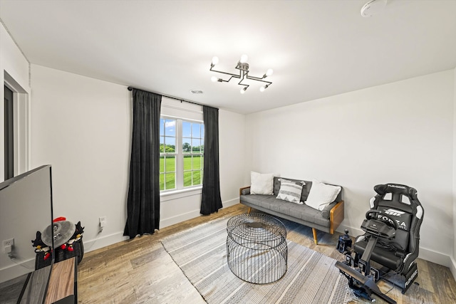 sitting room with light hardwood / wood-style floors