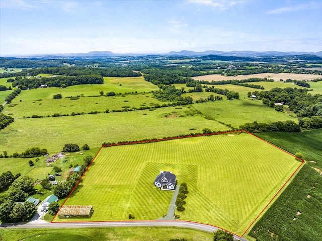 birds eye view of property featuring a rural view