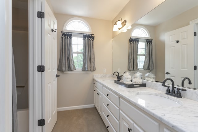 bathroom featuring double sink and oversized vanity