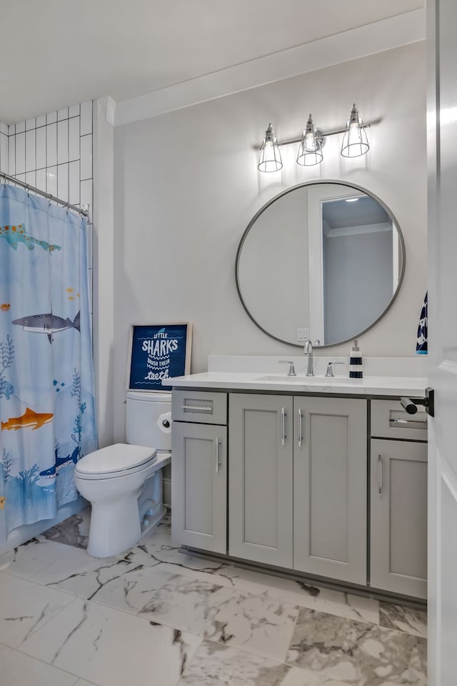 bathroom featuring tile floors, toilet, and vanity