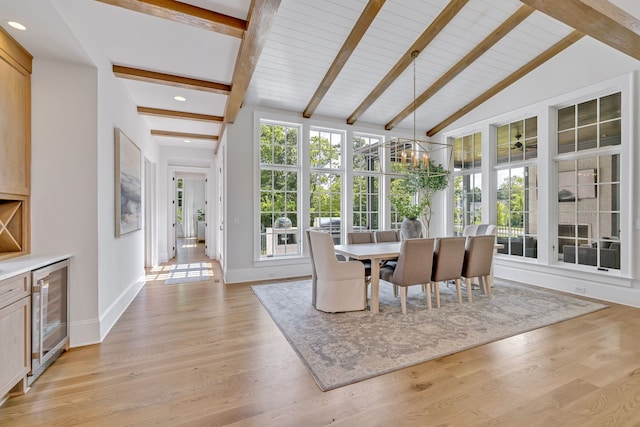 sunroom featuring wine cooler and vaulted ceiling with beams