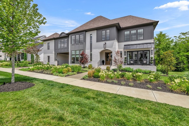 view of front of home with a front yard