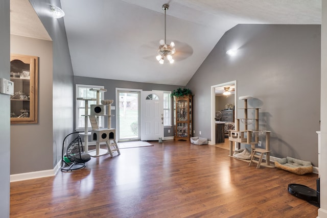 foyer featuring high vaulted ceiling, ceiling fan, and dark hardwood / wood-style flooring