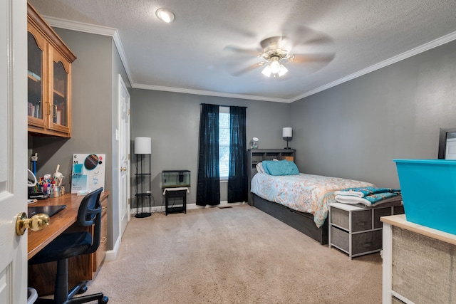 carpeted bedroom featuring ornamental molding, ceiling fan, and a textured ceiling