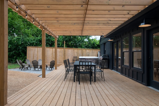 deck featuring a grill and french doors