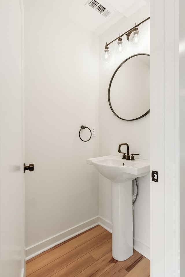 bathroom featuring hardwood / wood-style floors