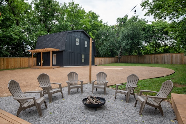 view of patio featuring an outdoor fire pit