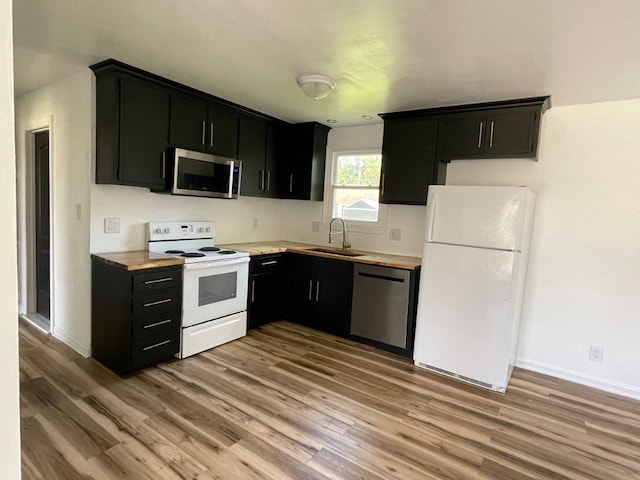 292 Northridge Dr, Clarksville, TN 37042 - kitchen with hardwood / wood-style floors, stainless steel appliances, and sink