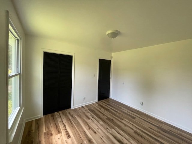 292 Northridge Dr, Clarksville, TN 37042 - unfurnished bedroom with a closet and dark hardwood / wood-style floors