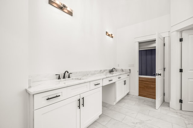 bathroom featuring double sink vanity and tile flooring