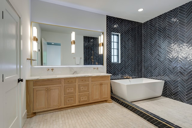 bathroom with tile flooring, tile walls, tasteful backsplash, and dual vanity