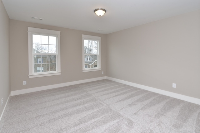 view of carpeted spare room