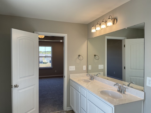 bathroom with dual bowl vanity