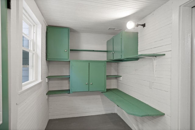 kitchen featuring green cabinets