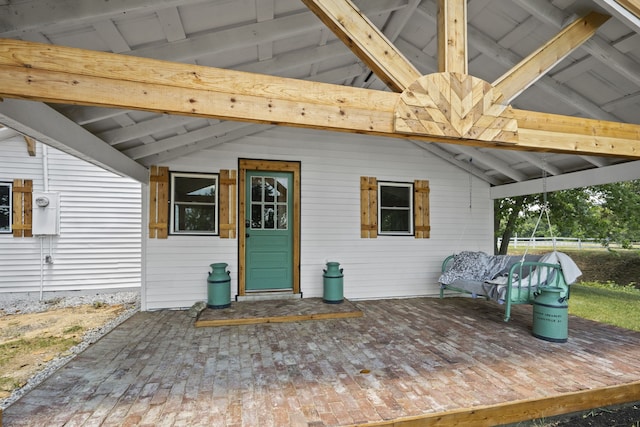 doorway to property featuring a patio