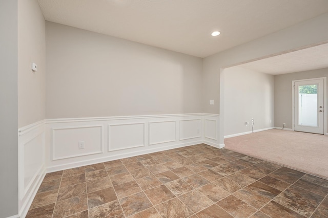 view of carpeted spare room