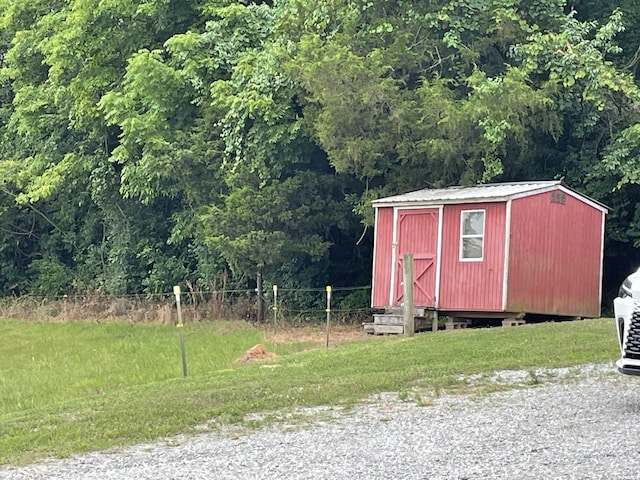 72 Golden Hollow Rd, Kelso, TN 37348 - view of outdoor structure featuring a lawn