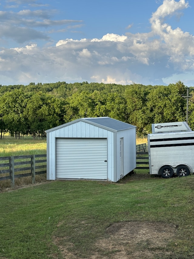 72 Golden Hollow Rd, Kelso, TN 37348 - garage featuring a yard