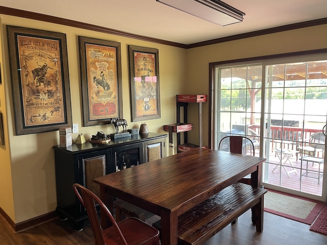 72 Golden Hollow Rd, Kelso, TN 37348 - dining space with dark hardwood / wood-style flooring and ornamental molding