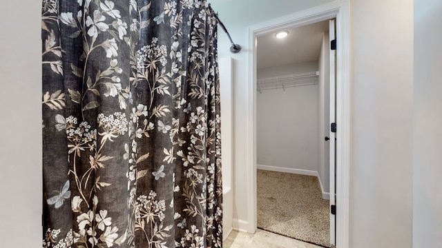 bathroom featuring tile floors