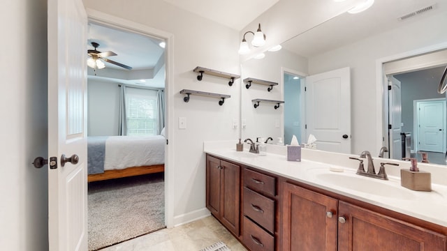 bathroom with ceiling fan, tile flooring, and double vanity