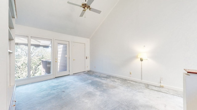 unfurnished room featuring ceiling fan, light carpet, and high vaulted ceiling