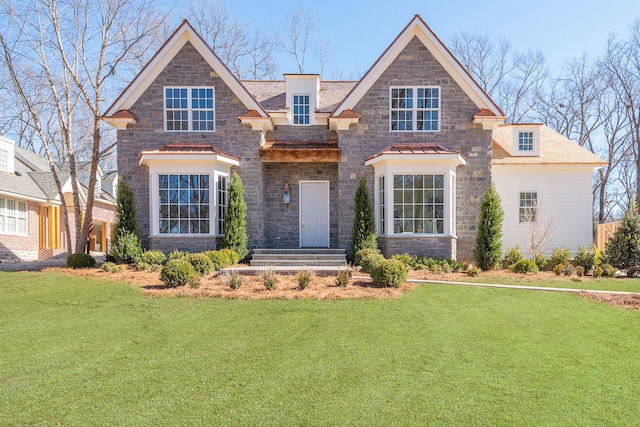 craftsman inspired home with a front yard