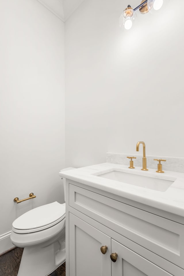 bathroom with vanity and toilet