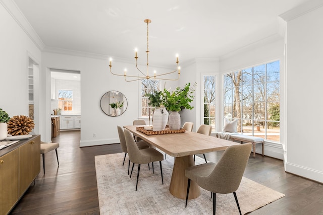 dining room featuring an inviting chandelier, ornamental molding, and dark hardwood / wood-style flooring