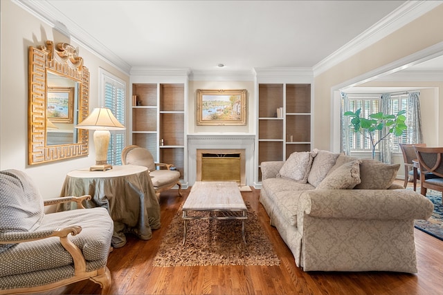 living room featuring dark wood-type flooring and ornamental molding