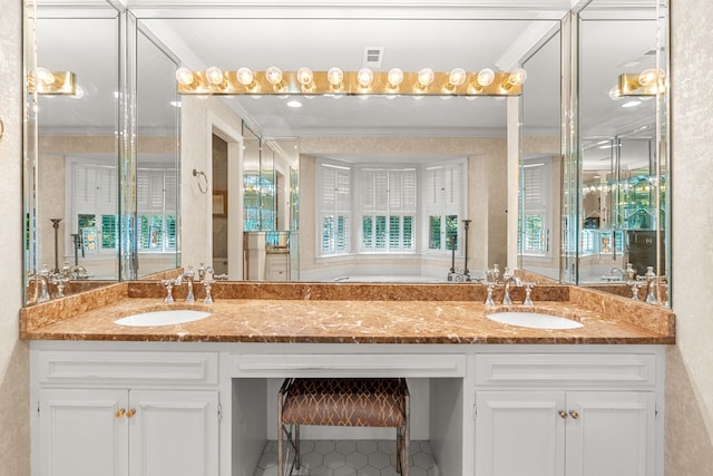 bathroom with dual bowl vanity, tile flooring, and crown molding