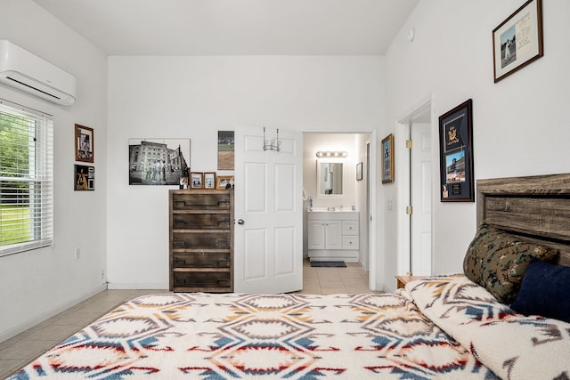 tiled bedroom with an AC wall unit and ensuite bathroom