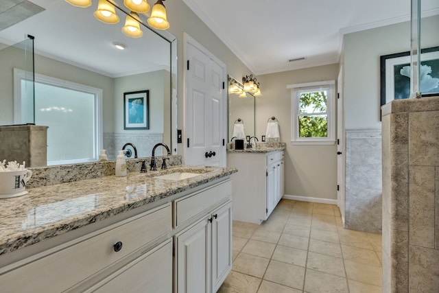 bathroom featuring dual bowl vanity, tile flooring, a notable chandelier, and crown molding