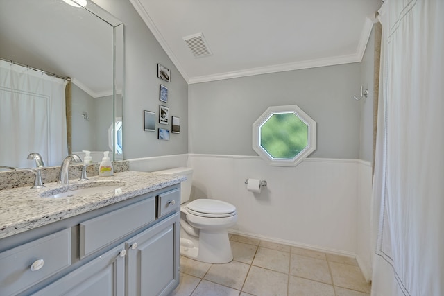 bathroom featuring tile flooring, toilet, large vanity, and crown molding