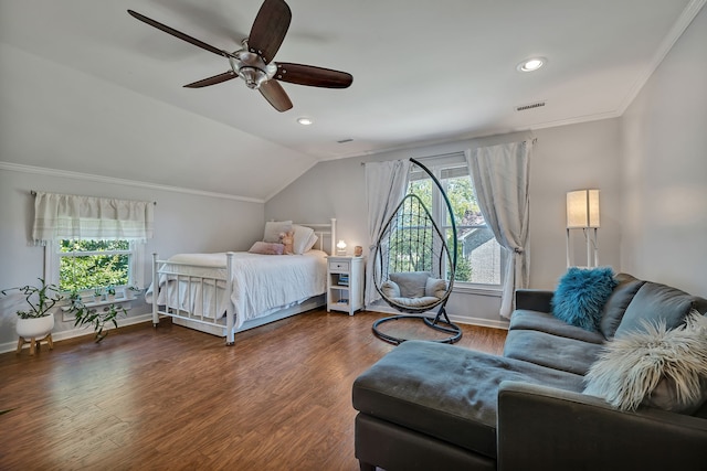 bedroom featuring crown molding, dark hardwood / wood-style floors, vaulted ceiling, and ceiling fan