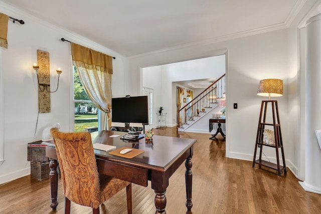 home office featuring crown molding and wood-type flooring