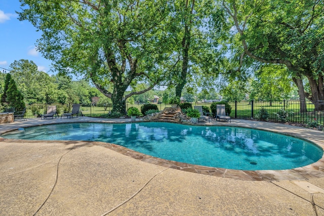 view of pool featuring a patio area