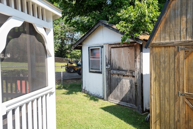 view of shed / structure featuring a yard