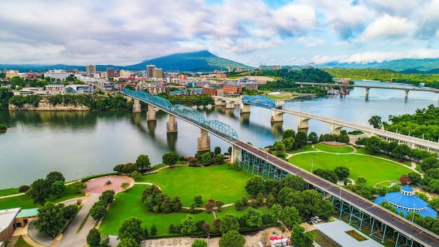 bird's eye view with a water and mountain view