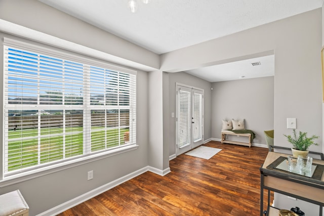 foyer featuring dark hardwood / wood-style flooring