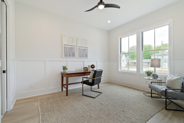 office area featuring ceiling fan and light hardwood / wood-style floors