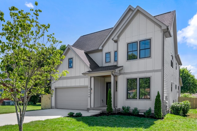 modern farmhouse featuring a front lawn and a garage