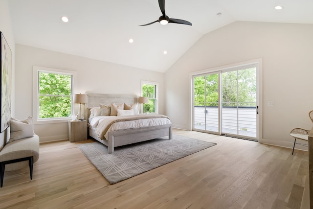 bedroom with ceiling fan, access to exterior, vaulted ceiling, and light hardwood / wood-style floors