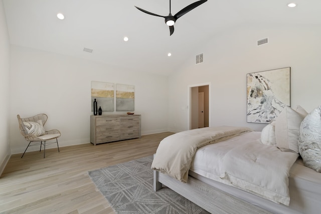 bedroom featuring high vaulted ceiling, ceiling fan, and light wood-type flooring